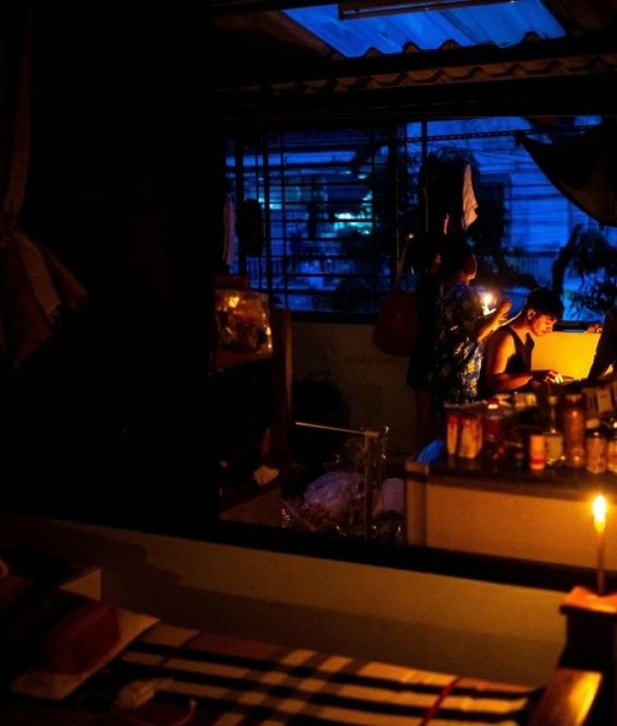 Thai family trapped by floods clings to furniture for 48 hours to survive