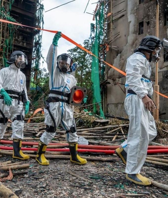 Hong Kong scrambles to remove scaffolding nets after deadly fire; contractors to foot bill 