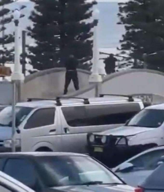 Two in custody as police respond to reports of gunfire at Sydney’s Bondi Beach