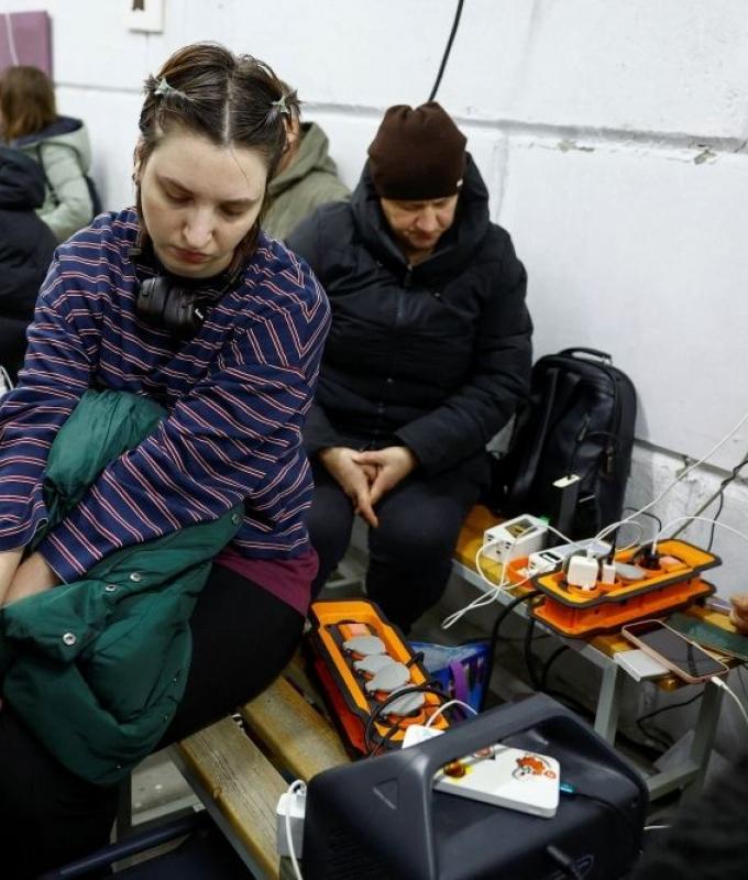 Ukrainians withstand days-long power cuts in crowded ‘resilience’ shelters