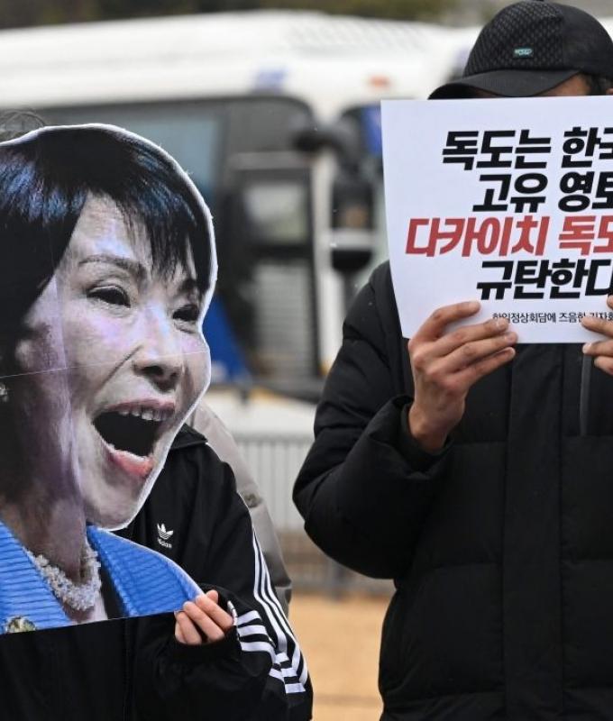 Leaders of Japan and South Korea meet as China flexes muscles