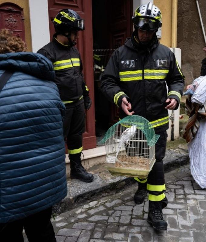 Firefighters rush to save parrots and pets as Sicilian town reels from cliff‑edge collapse