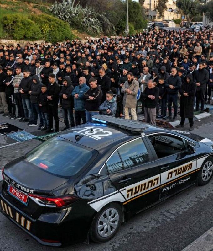 Worshippers blocked from Al-Aqsa mosque hold Eid prayers outside gates in Jerusalem