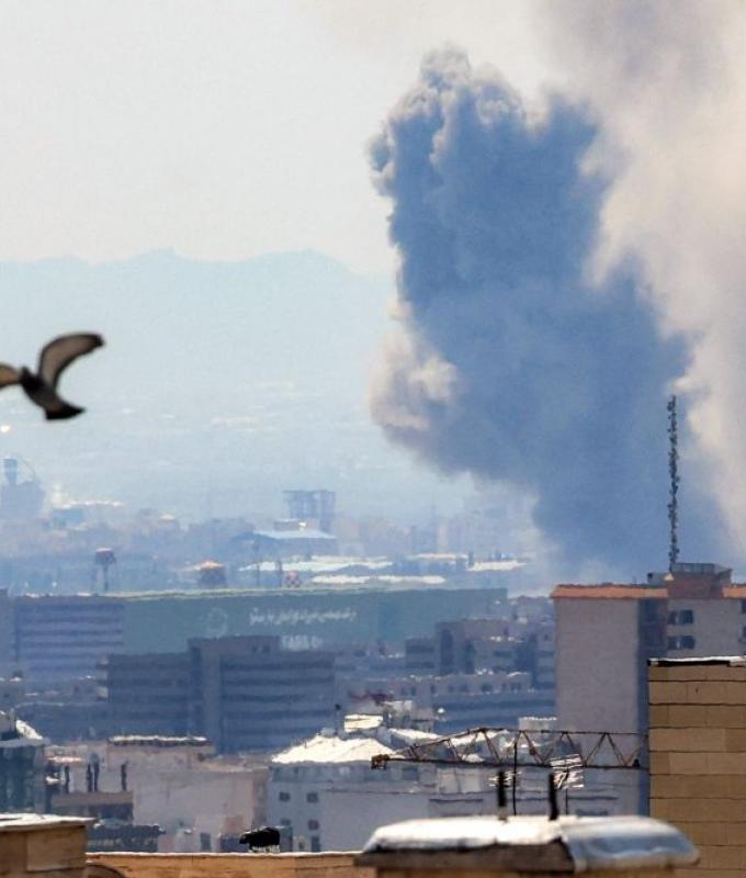 Iran says infrastructure hit in wave of US‑Israeli strikes amid widening conflict