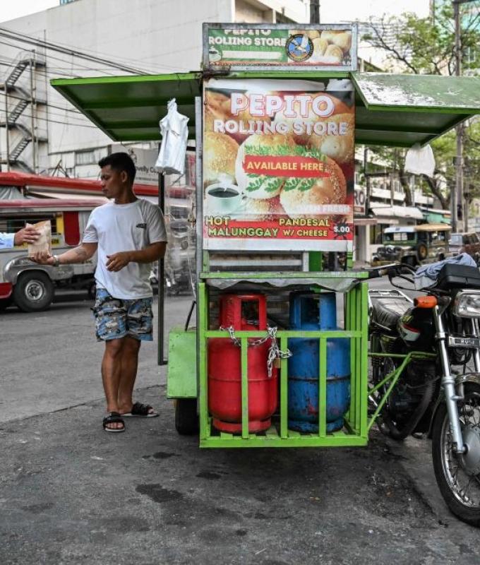 Filipinos feel pinch as LPG prices soar, hitting street food vendors after Middle East conflict