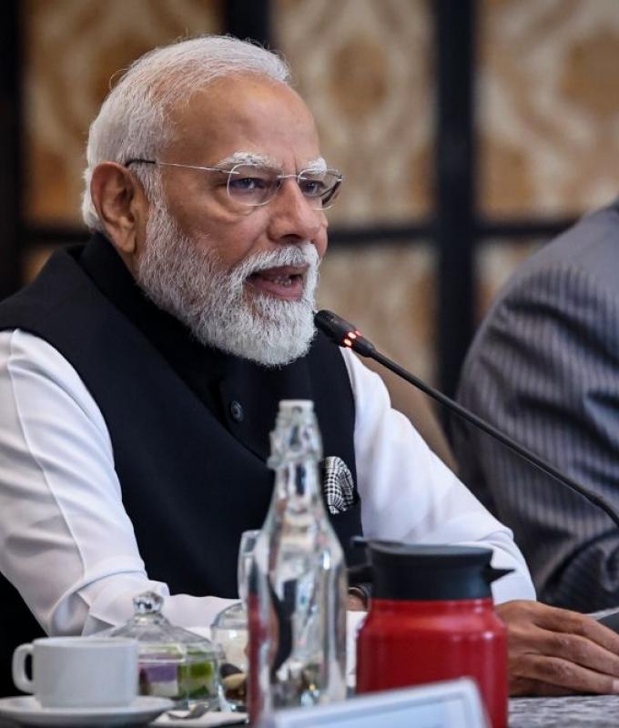 India's Modi pushes plan to expand parliament and reserve seats for women, opposition protests