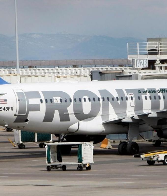 Frontier plane kills trespasser on Denver runway, 12 injured in evacuation after engine fire