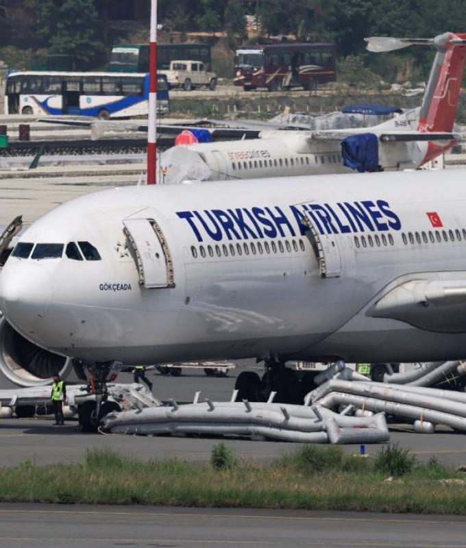 Turkish Airlines A330 evacuated after landing‑gear fire shuts Kathmandu airport, passengers safe