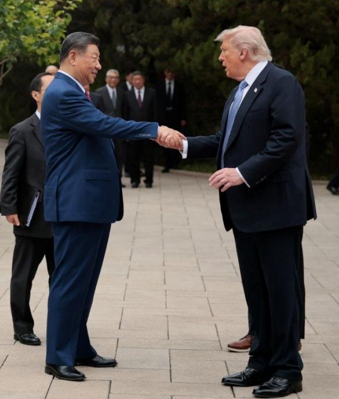 Trump departs China with ‘underwhelming’ trade deals and warning on Taiwan