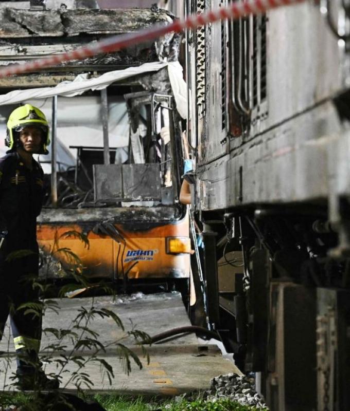 Thai authorities charge bus and train drivers after deadly level crossing collision in Bangkok