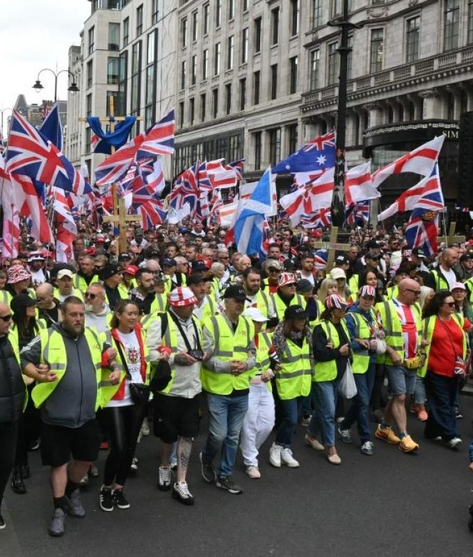‘Make England Great Again’: Tommy Robinson rally draws tens of thousands amid rival London protests