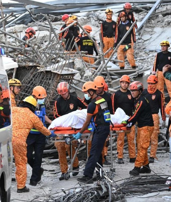 Malaysian among dead after building collapse traps dozens in the Philippines