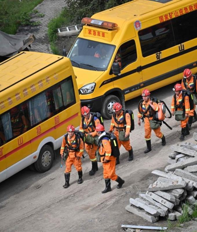 China rescuers search for two men still missing after mine blast kills 82