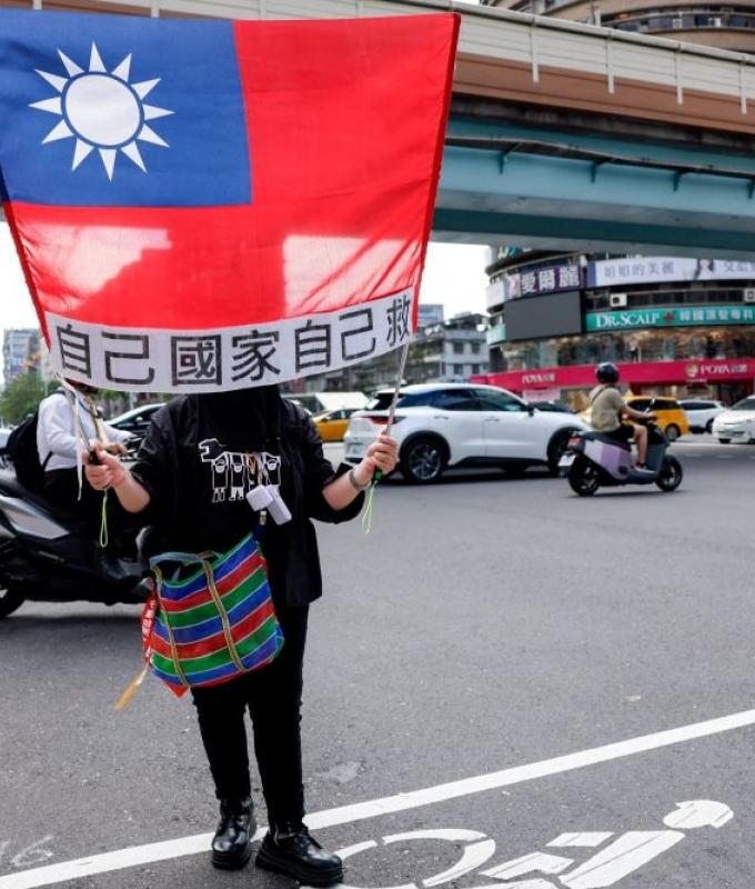 Taiwan says Chinese coast guard ship leaves Pratas waters after tense standoff