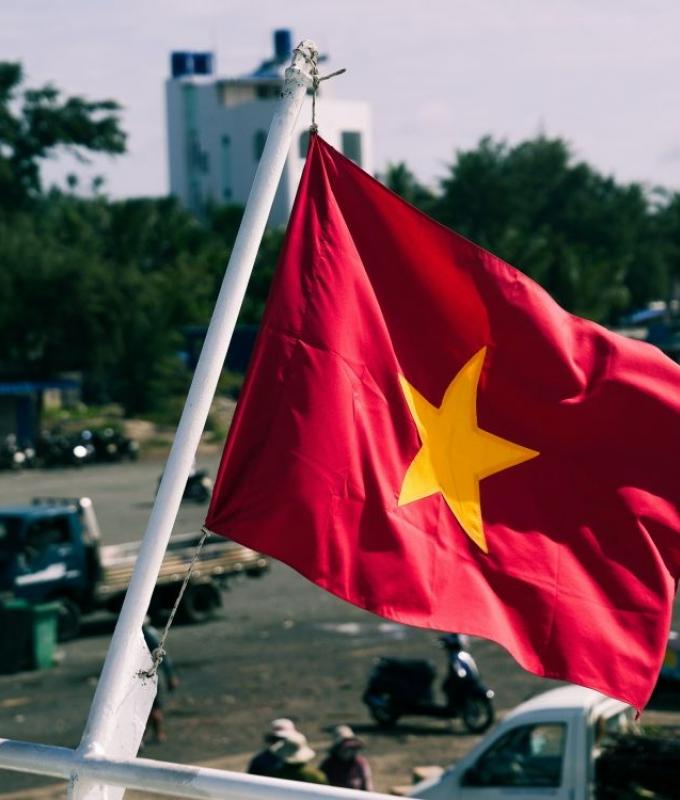 Vietnam arrests two over shooting of Australians in Ho Chi Minh