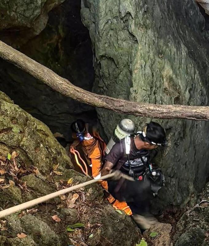 Rescuers find five out of seven people trapped in Laos cave alive, safe
