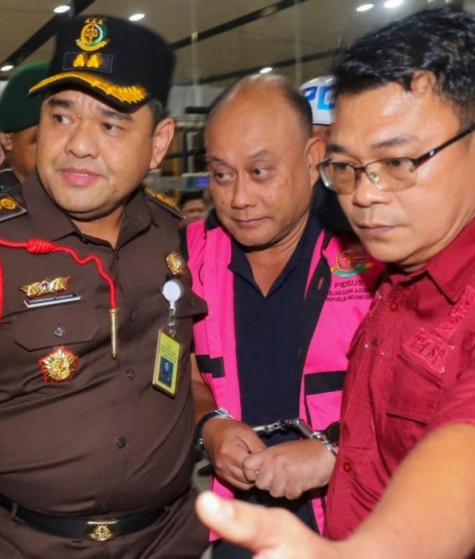 Indonesia arrest former chief of free school meals agency a day after dismissal