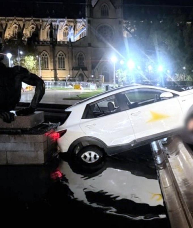 Sorry, officer: Frenchman eating McDonald's crashes into historic Sydney fountain, police say