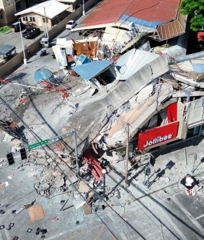 At least 15 killed in major quake off Philippines