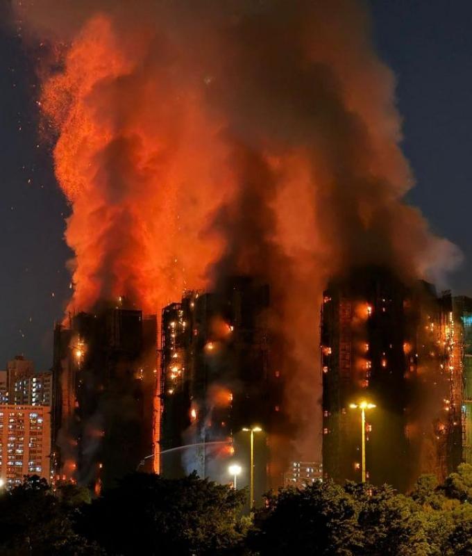 Hong Kong charges seven, two companies over deadly 168-victim residential fire