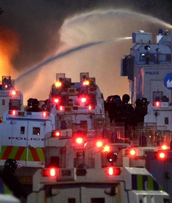 Police deploy water cannon as Northern Ireland unrest enters second night after Belfast stabbing