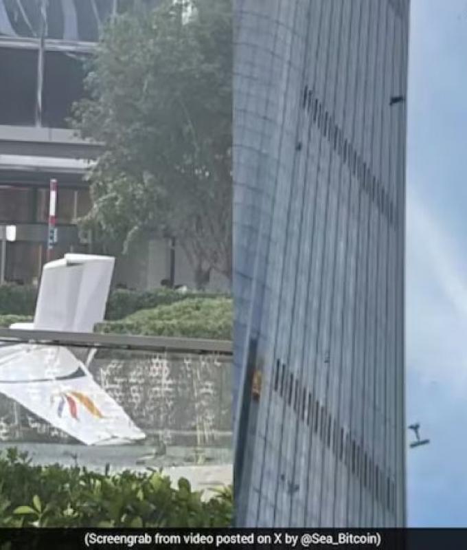 Pilot killed after small aircraft crashes into Beijing’s tallest building, 13 injured