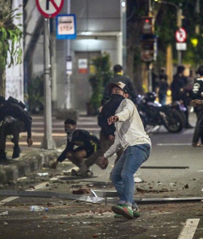 Indonesia charges four after fuel price protests turn violent