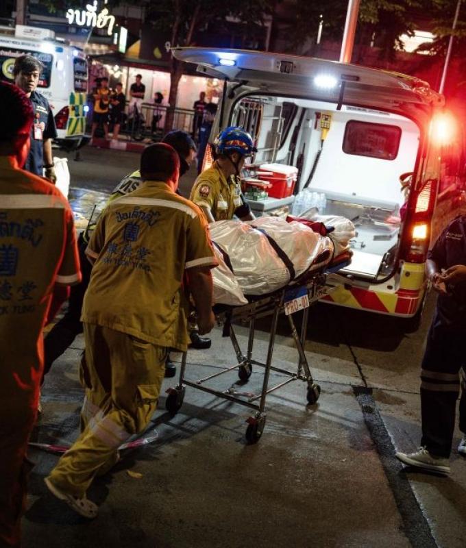 Investigators comb wreckage after Bangkok bar fire kills 27, injures 73