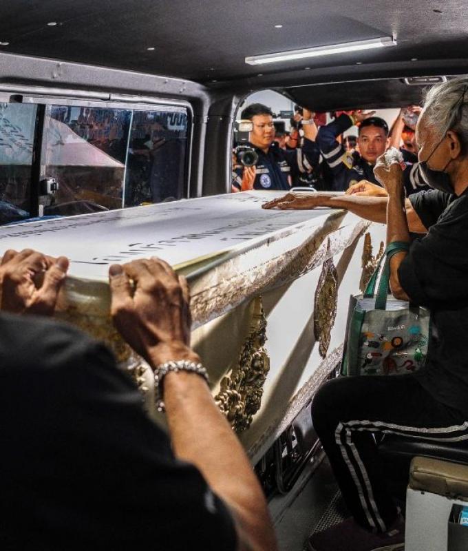 Families claim bodies as Bangkok fire toll rises to 30