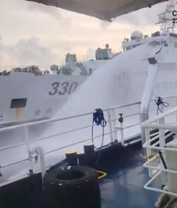 China fires water cannon at Philippine coast guard vessels near Scarborough Shoal