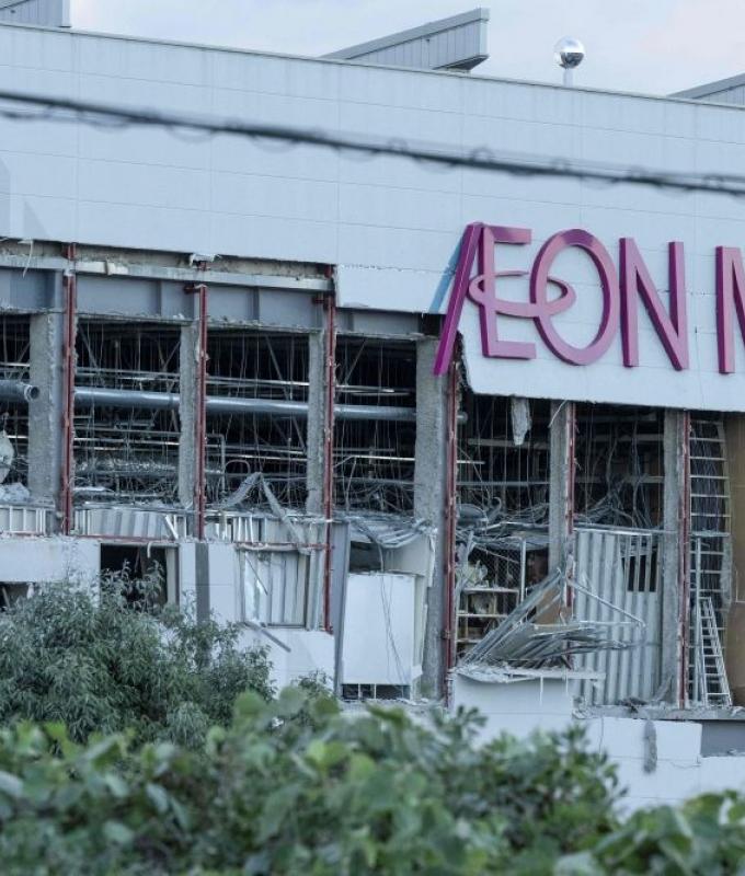 Two women killed in Aeon Mall explosion had been ordered to re-enter mall after earthquake to secure money