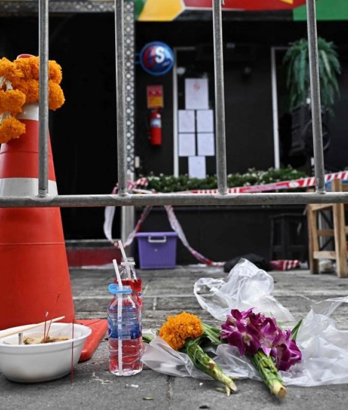 Bangkok bar owner faces up to 10 years over negligence charge after fire kills 37