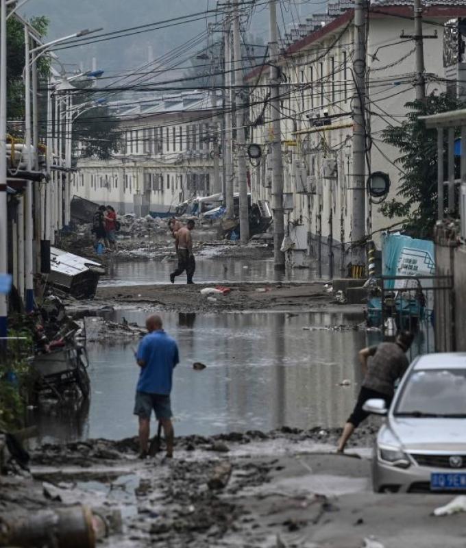 South China floods death toll jumps to 159 with 10 still missing