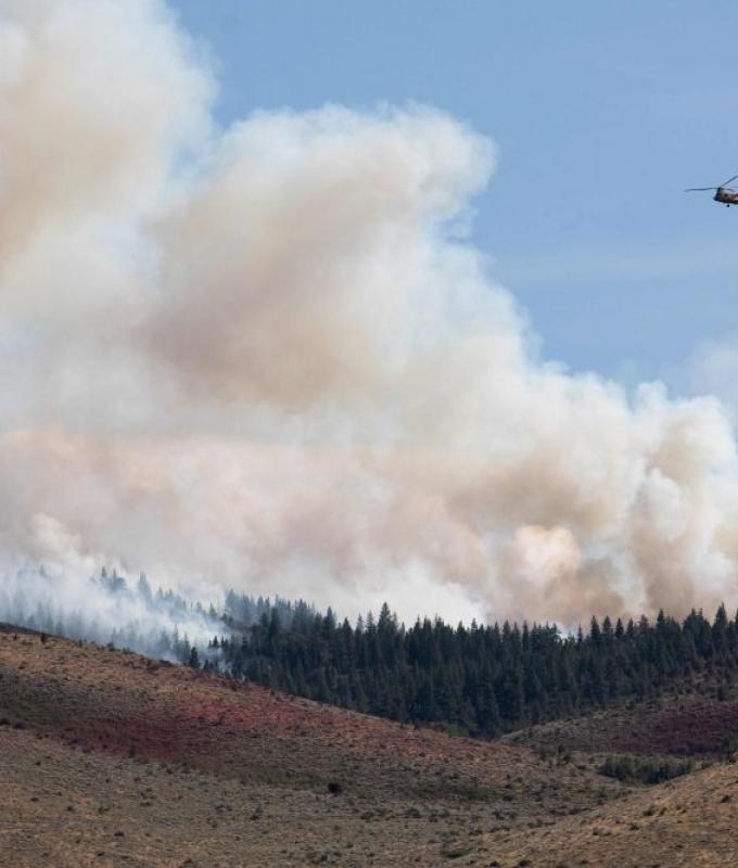 Fast-moving wildfire threatens Reno as tens of thousands ordered to flee