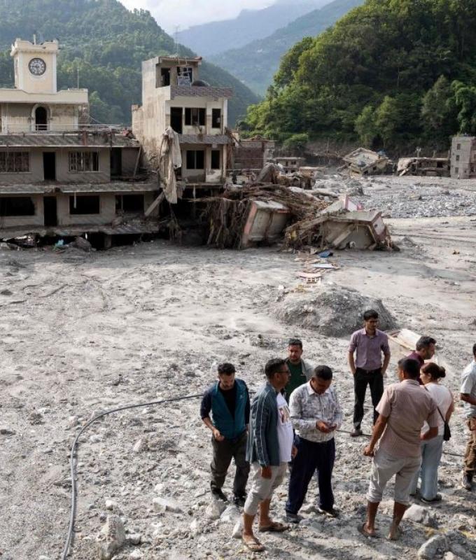 Rescuers dig into tunnel as missing toll from Nepal, China flood tops 3,000
