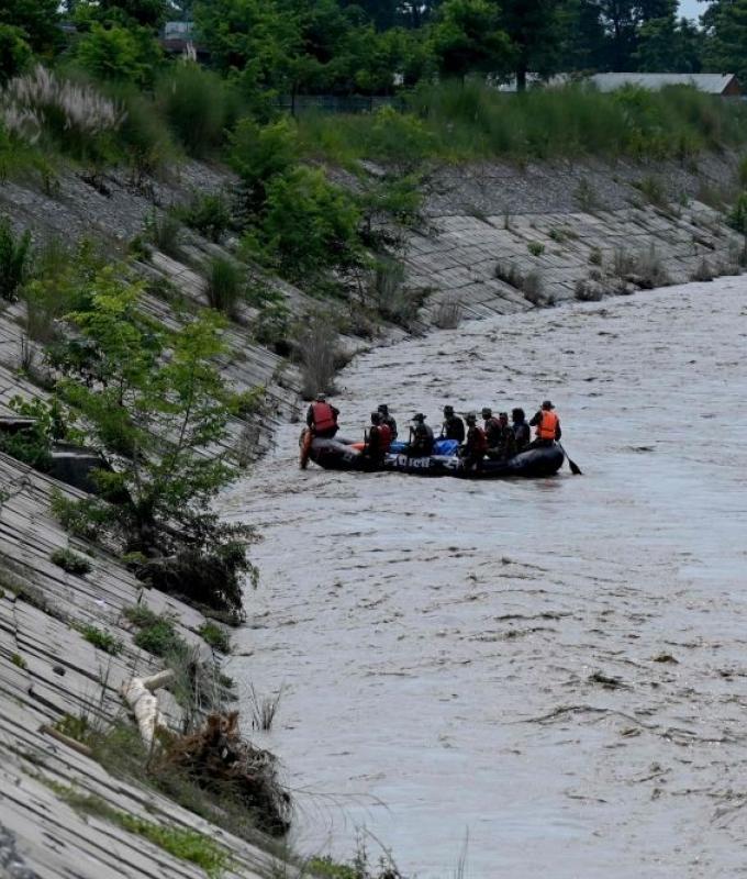 Swollen rivers, deep gorges and washed‑out roads hinder Nepal rescue effort as flood toll rises