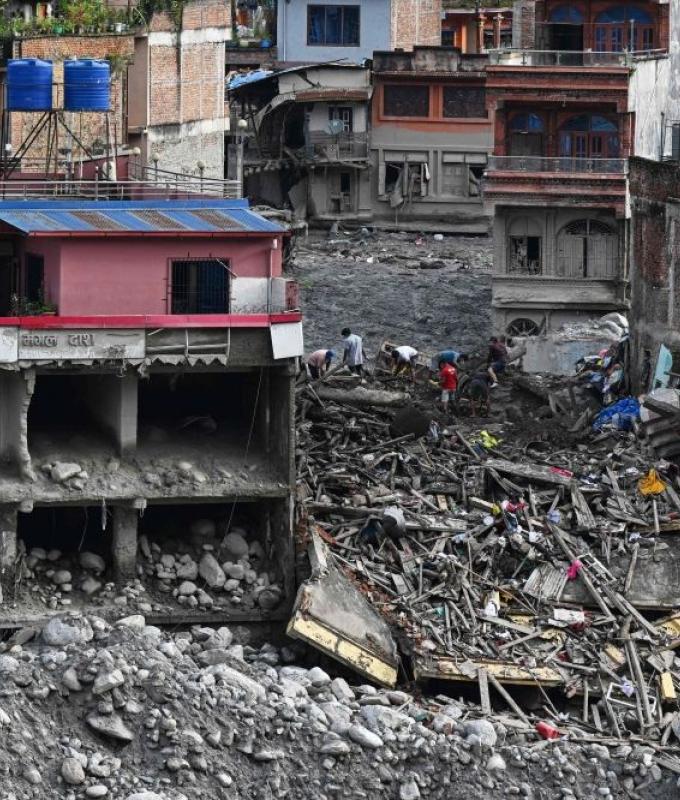 Two Nepal rescues revive hopes 10 days after flood