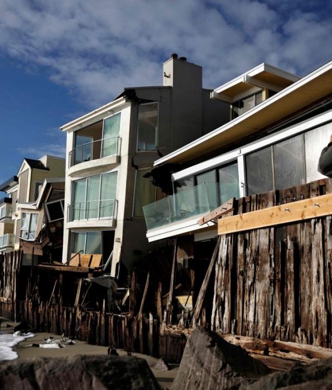 ‘Devastating’ waves leave California beach homes on brink of collapse