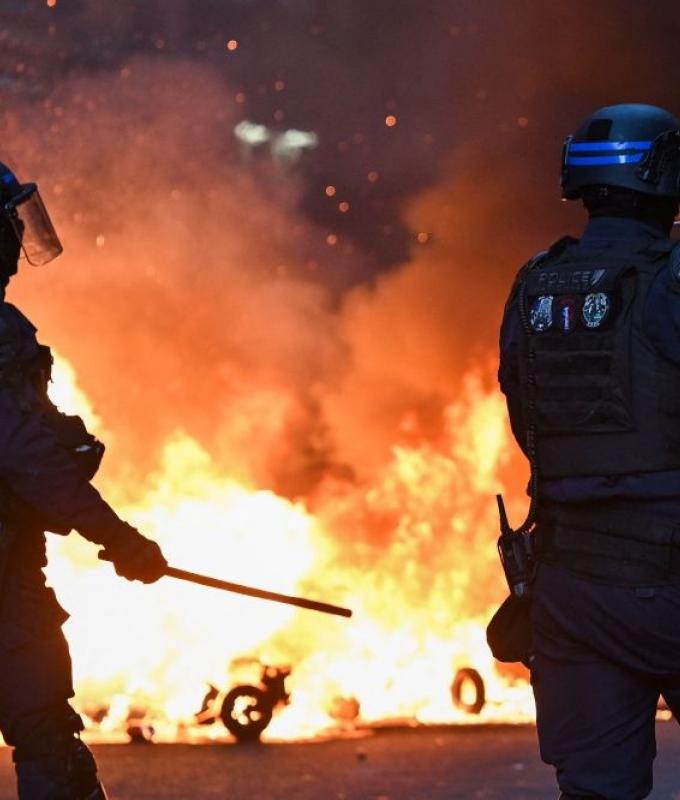 Macron slams ‘unbridled’ violence as nearly 2,400 arrested in France unrest