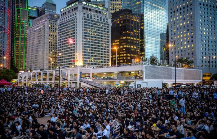 Hong Kong's summer of protests leaves economy bruised and battered