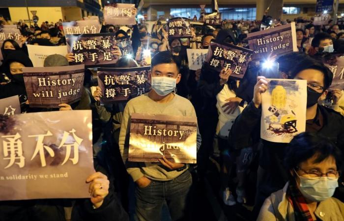 Hong Kong protesters face off with police in mall protests