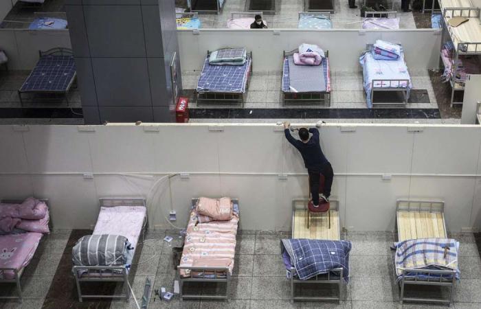 Coronavirus: Latest updates as China scrambles to find beds for newly infected