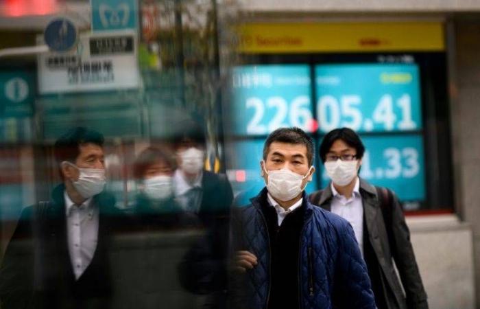 Dozens allowed off Japan virus-hit ship have 'symptoms': Minister