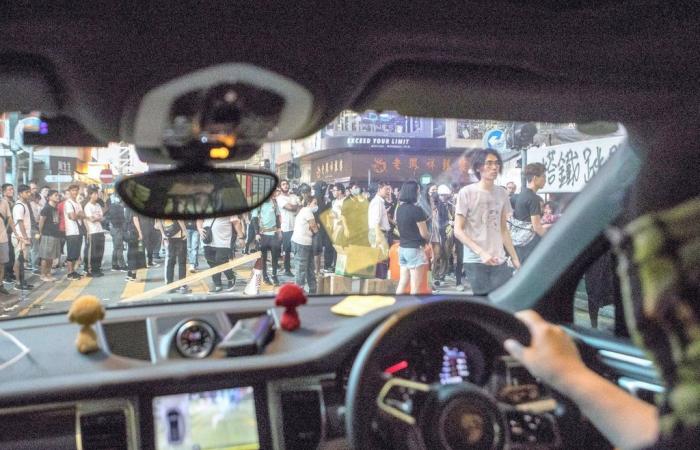 Wealthy businessmen among anonymous ride share network providing Hong Kong protesters safe passage home