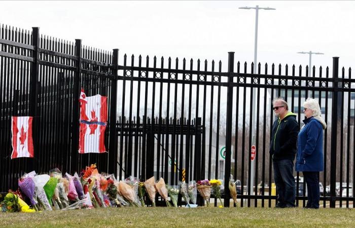 Families mourn as police seek motive for Canada gun rampage
