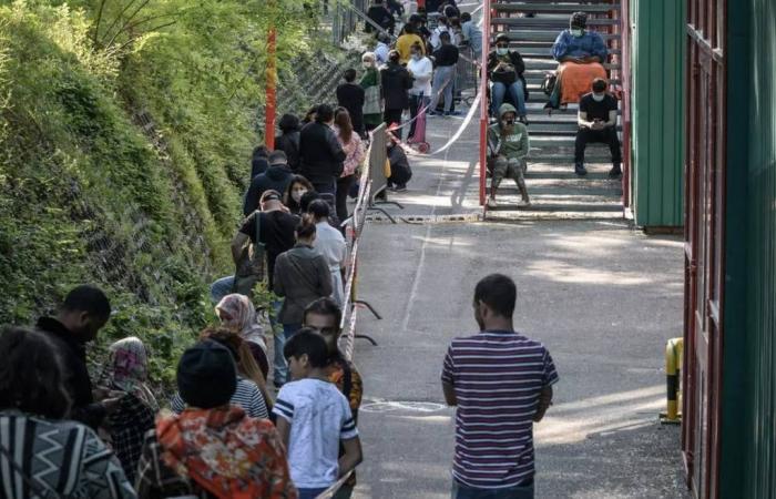 Coronavirus impact: Crisis lays bare poverty in Geneva, as thousands queue for food