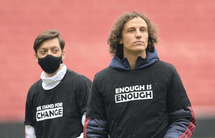 Mesut Ozil, David Luiz and Arsenal stars take a knee and display 'I can't breathe', 'Black Lives Matter' shirts at the Emirates - in pictures