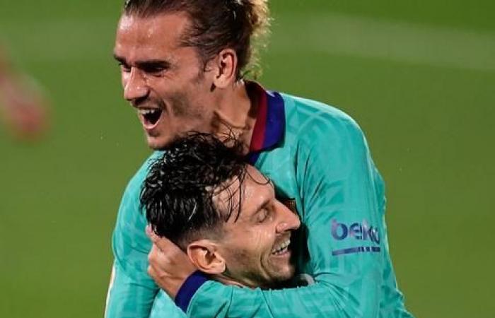 Antoine Griezmann gets celebration hug from Lionel Messi as Barcelona leave troubles behind - in pictures