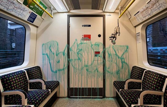 Banksy’s face mask artwork worth £7.5 million scrubbed from London Underground train