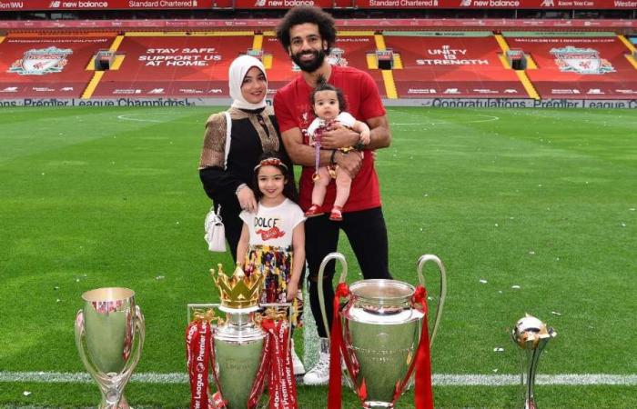 Mohamed Salah introduces his family to the Premier League trophy after Liverpool triumph